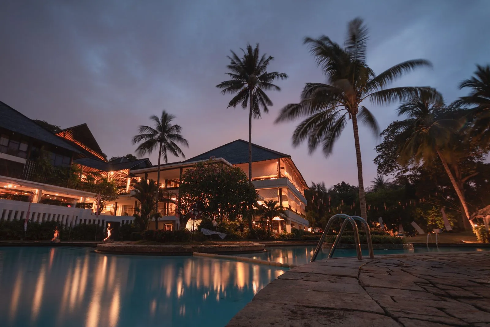 Hotel and pool at dusk