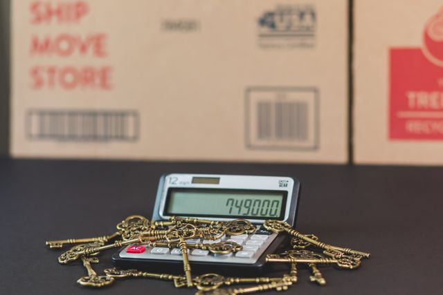 Clés et calculatrice pour une évaluation immobilière